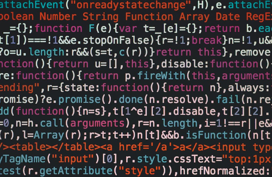 An image showing a person typing code on a computer screen